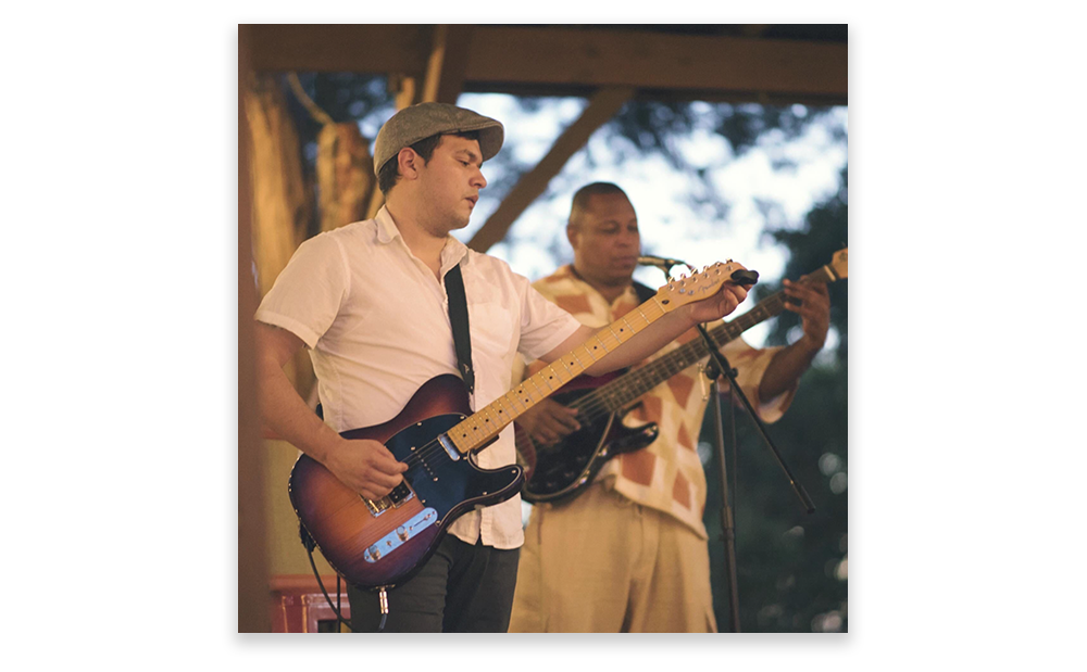 Mauro Playing Guitar on Stage